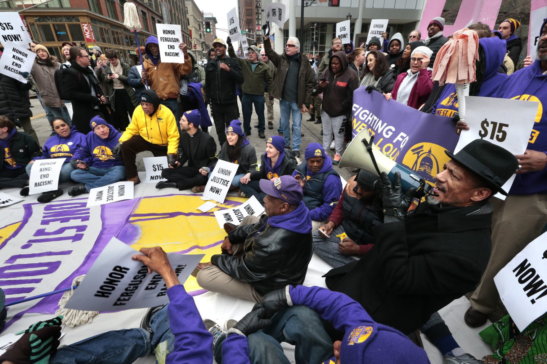Arrests made as protesters call for pay raise for local janitors